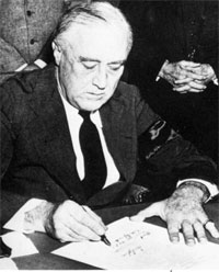 Franklin Delano Roosevelt Signs Declaration of War Against Japan